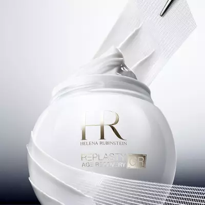 Helena Rubinstein Replasty Age Recovery GR cream jar with a rich white cream texture being lifted.