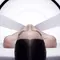 Woman's face lifted by white bands, evoking the Replasty soothing bandage technology
