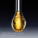 Golden serum droplet with Pro-Xylane™ ingredient, showing its rich, bubbly texture and luxurious essence.